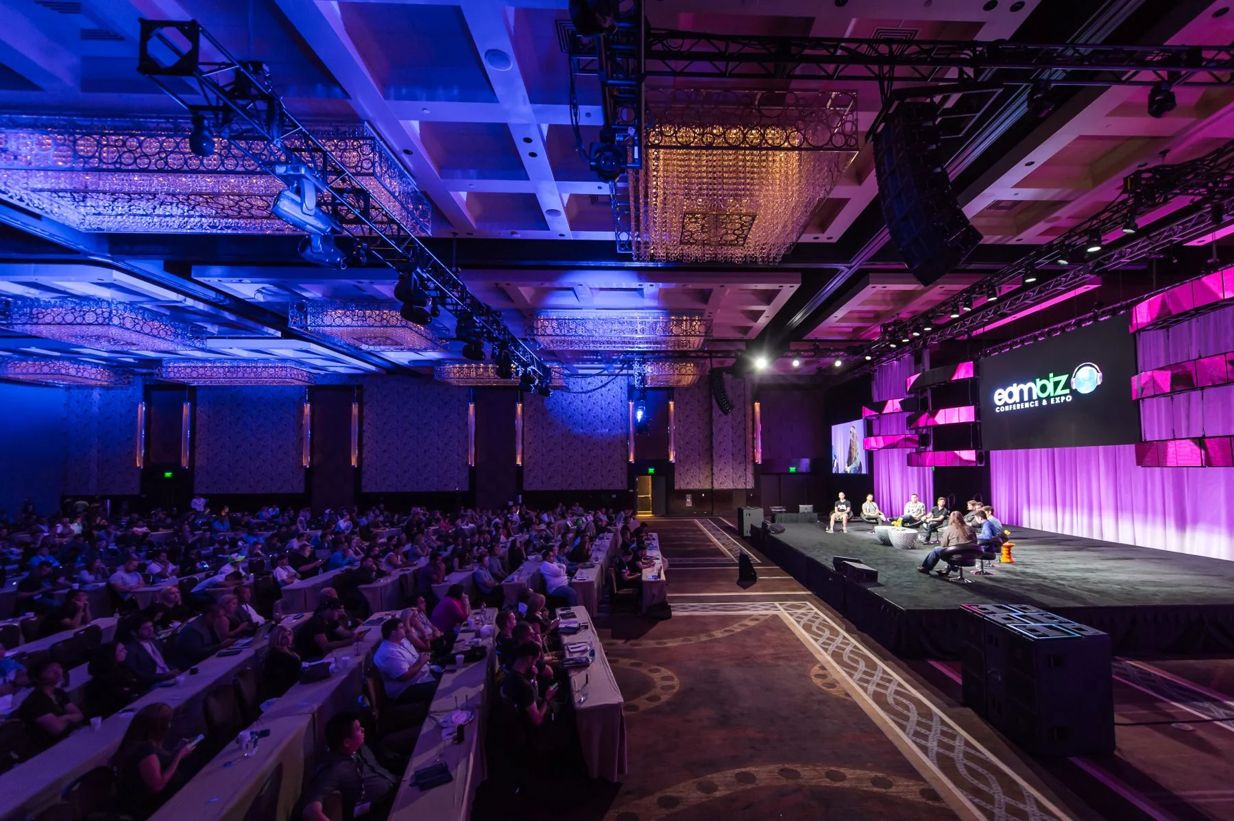 LED wall and projector setup at a corporate conference in Titusville, Florida by AVR Expos.
